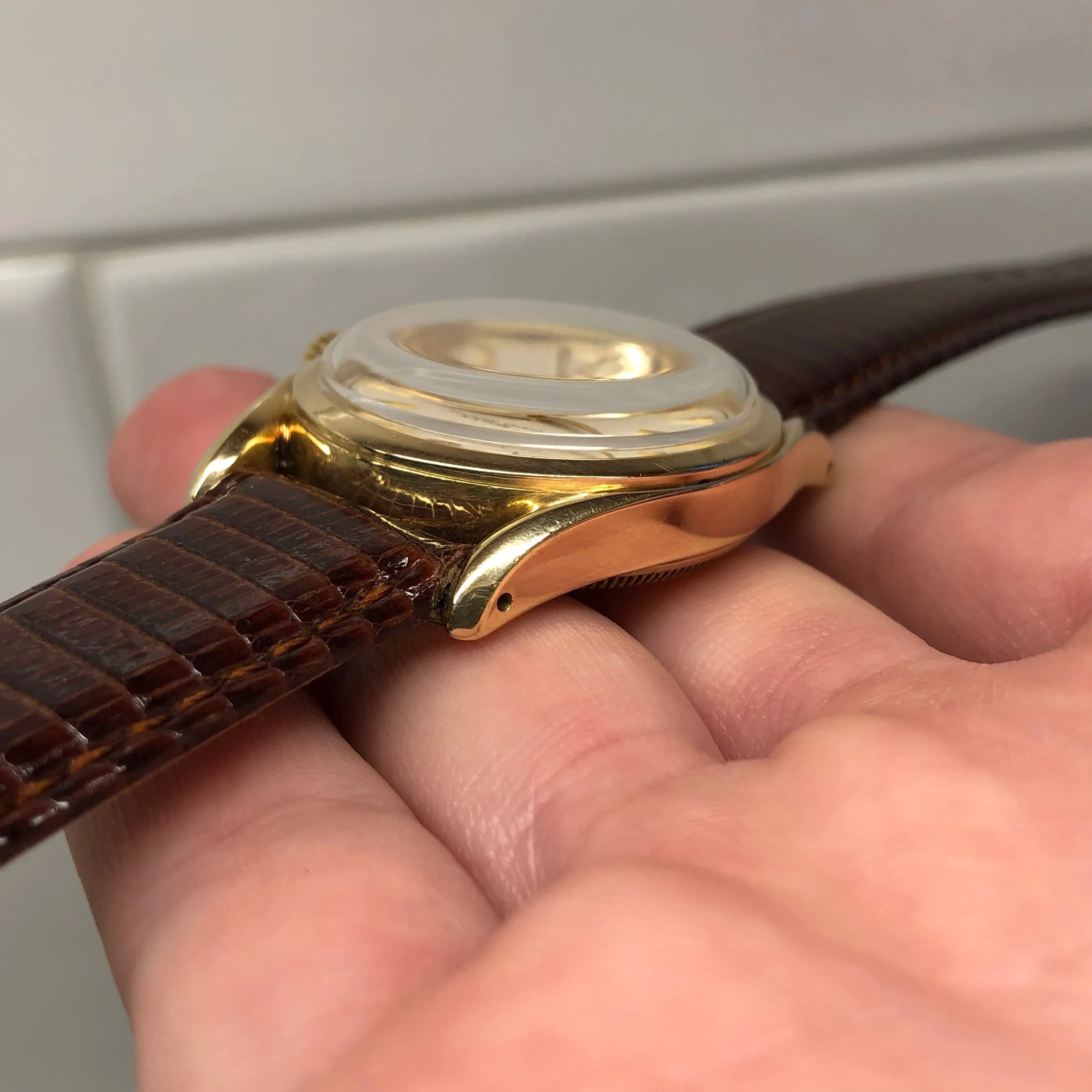 1952 Rolex Bombay 6090 Oyster Perpetual 14K Yellow Gold Red “Officially” Original Dial Wristwatch