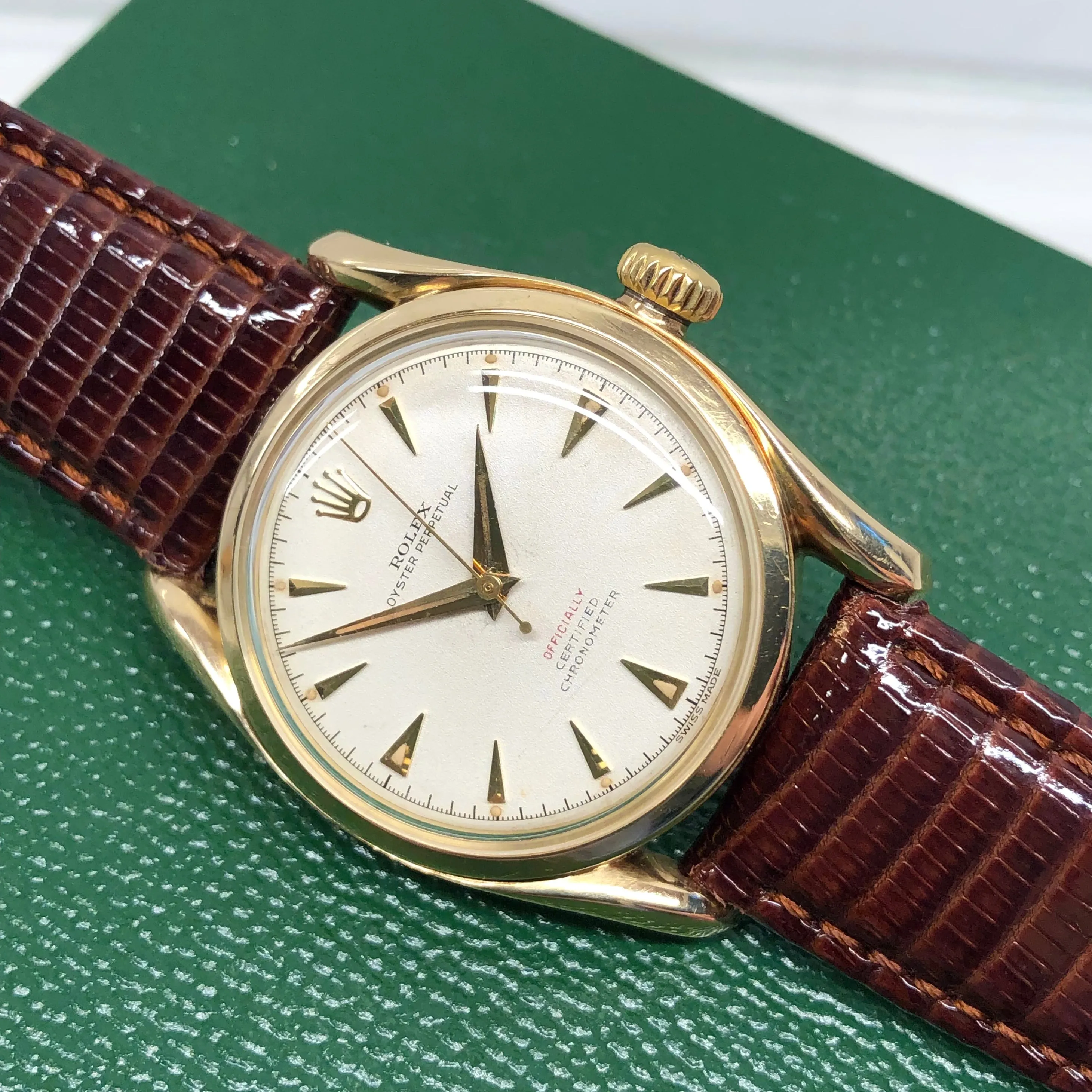1952 Rolex Bombay 6090 Oyster Perpetual 14K Yellow Gold Red “Officially” Original Dial Wristwatch
