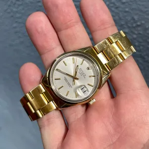 1970 Vintage Rolex Oyster Perpetual Date 1550 Silver Stick Cal. 1570 Automatic Gold Shell Wristwatch