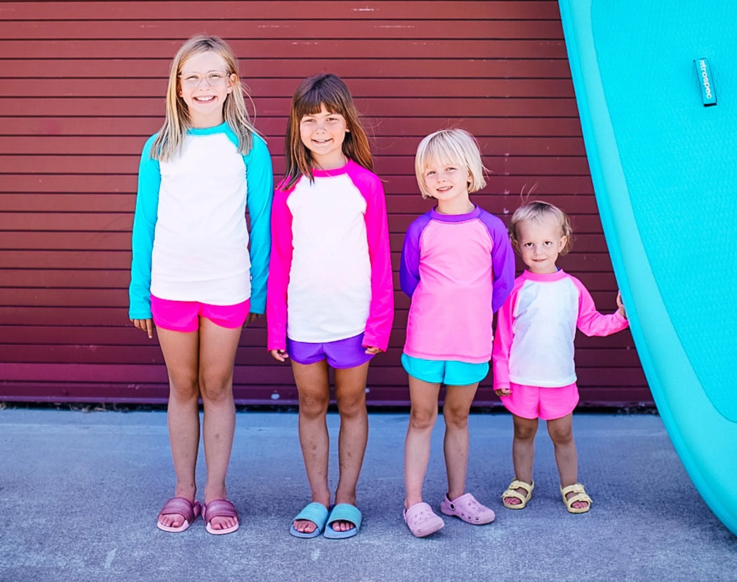 Girls UPF 50  Color Block Long Sleeve Rashguard | White with Turquoise