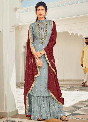 Ice Blue And Maroon Embroidered Gharara Style Suit