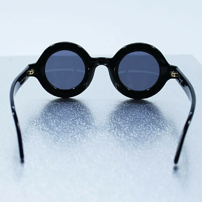 Vintage CHANEL black round frame mod sunglasses with white CHANEL PARIS logo. 060412