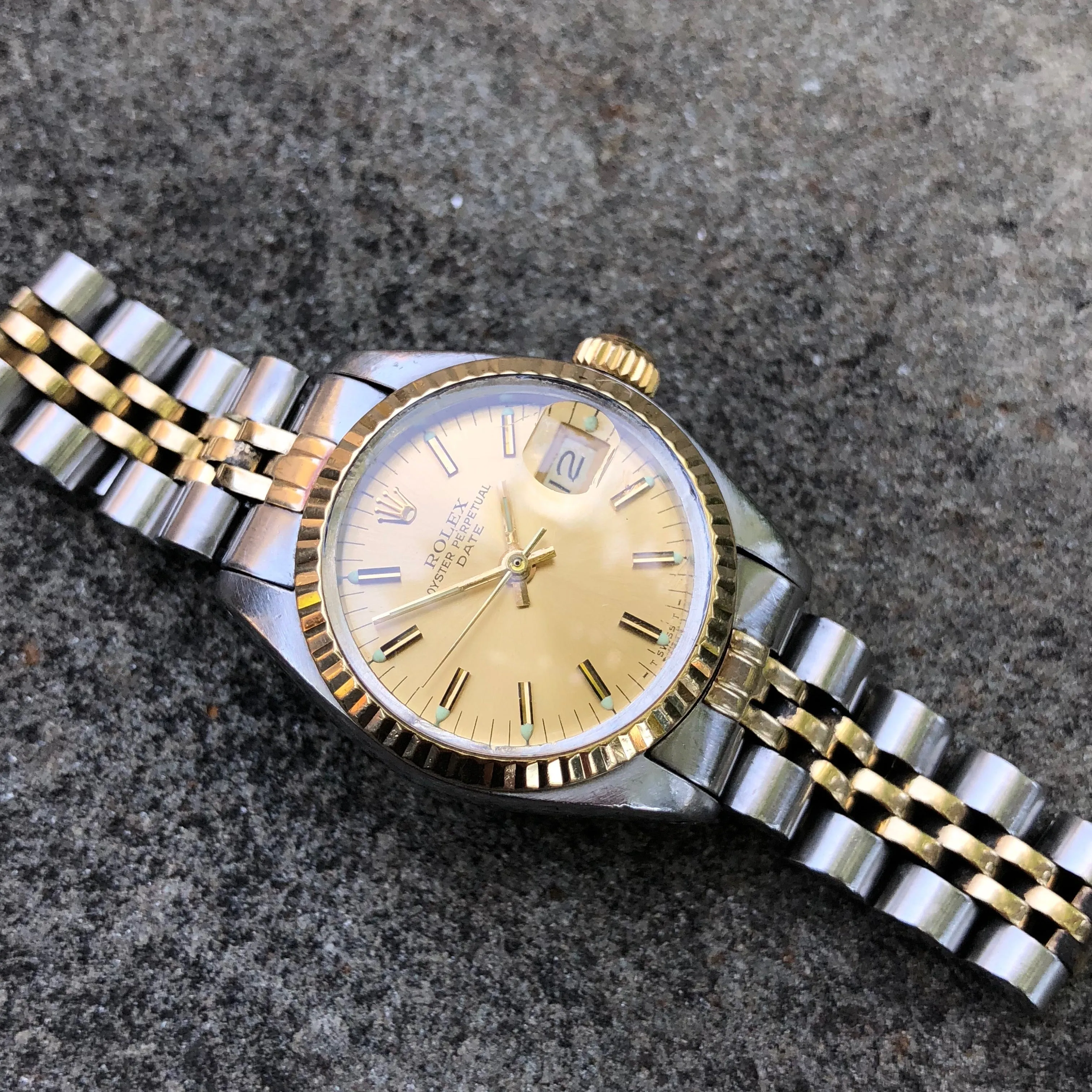 Vintage Rolex Date 6917 Ladies Two Tone Champagne Stick Steel 18K Wristwatch Circa 1979