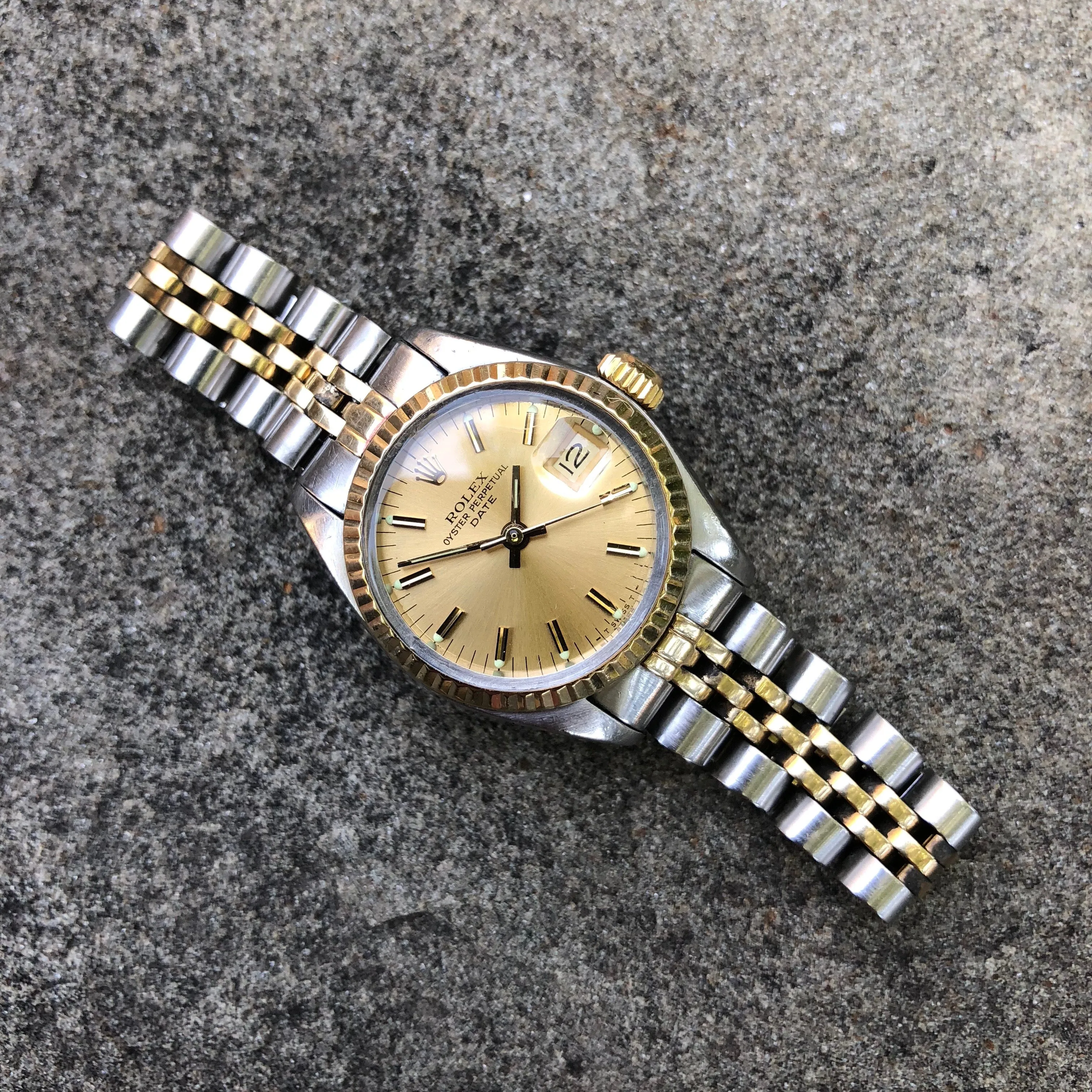 Vintage Rolex Date 6917 Ladies Two Tone Champagne Stick Steel 18K Wristwatch Circa 1979