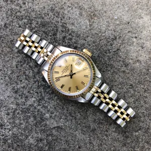 Vintage Rolex Date 6917 Ladies Two Tone Champagne Stick Steel 18K Wristwatch Circa 1979