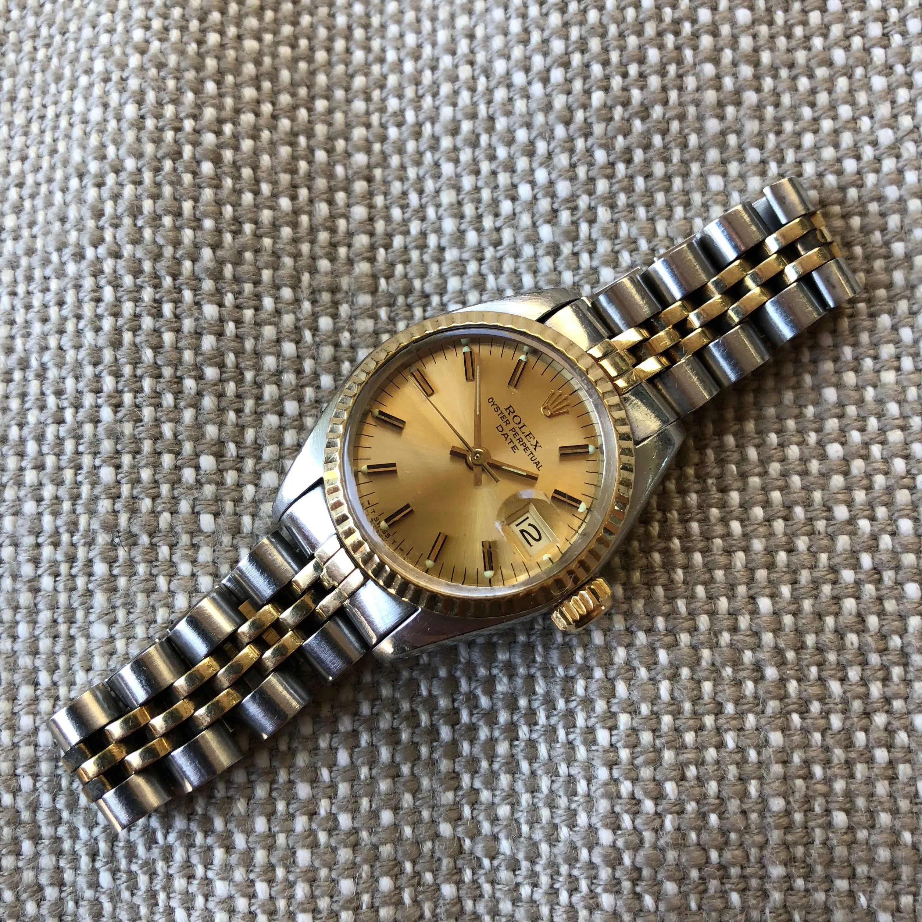 Vintage Rolex Date 6917 Ladies Two Tone Champagne Stick Steel 18K Wristwatch Circa 1979